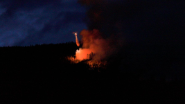 V10742 night vision equipped helicopters heli-tanking on south edge of fire night July 10.jpg