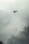 V10742 helicopter bucketing on the fire July 11.jpg